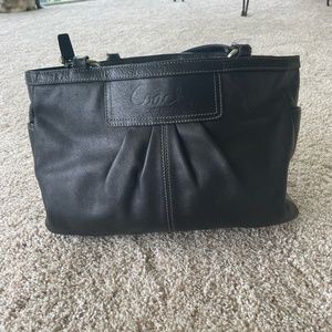 Black Coach Purse with Purple Inside